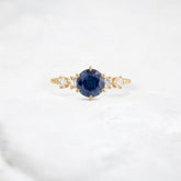 aurora-crown-colorful-halo-round-moissanite-engagement-ring-1-5-ct-yellow-gold-gemfora-1